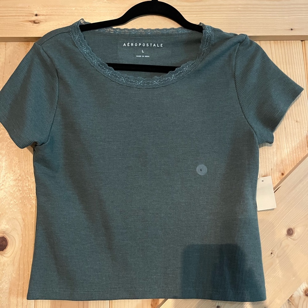 New with tags- Aeropostale Shirt size Large.